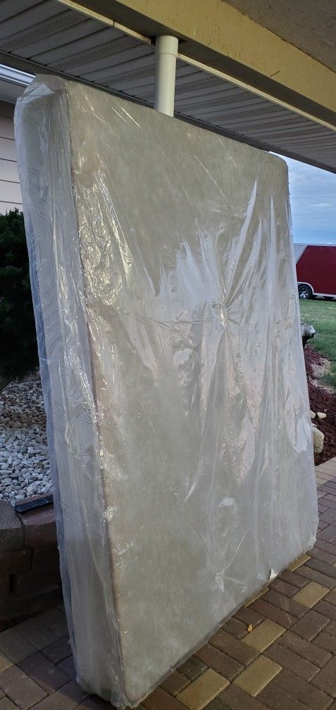 queen size bed box spring in original plastic. delivery available