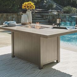 Windon Barn - Brown - 7 Pc. - Fire Pit Table, 4 Arm Chairs, 2 Swivel Chairs