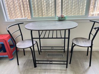 Table and dining chairs