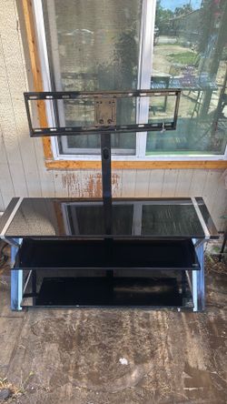 Tv mount/ entertainment center