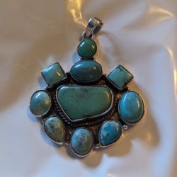 Turquoise And Silver Pendant