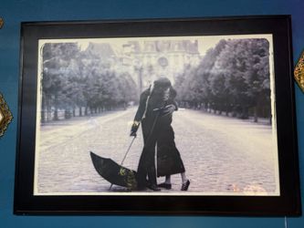 Parisian Kiss By Elliott Erwitt