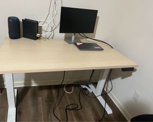 Electric adjustable standing desk with white legs
