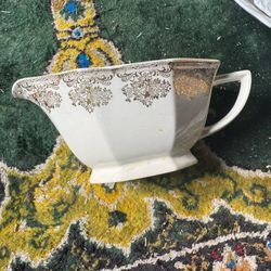 vintage gravy boat, by the Royal China Company, specifically iDuane pattern.