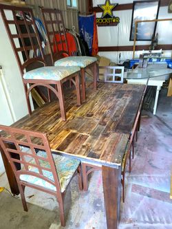 Custom solid wood plank table and metal chairs