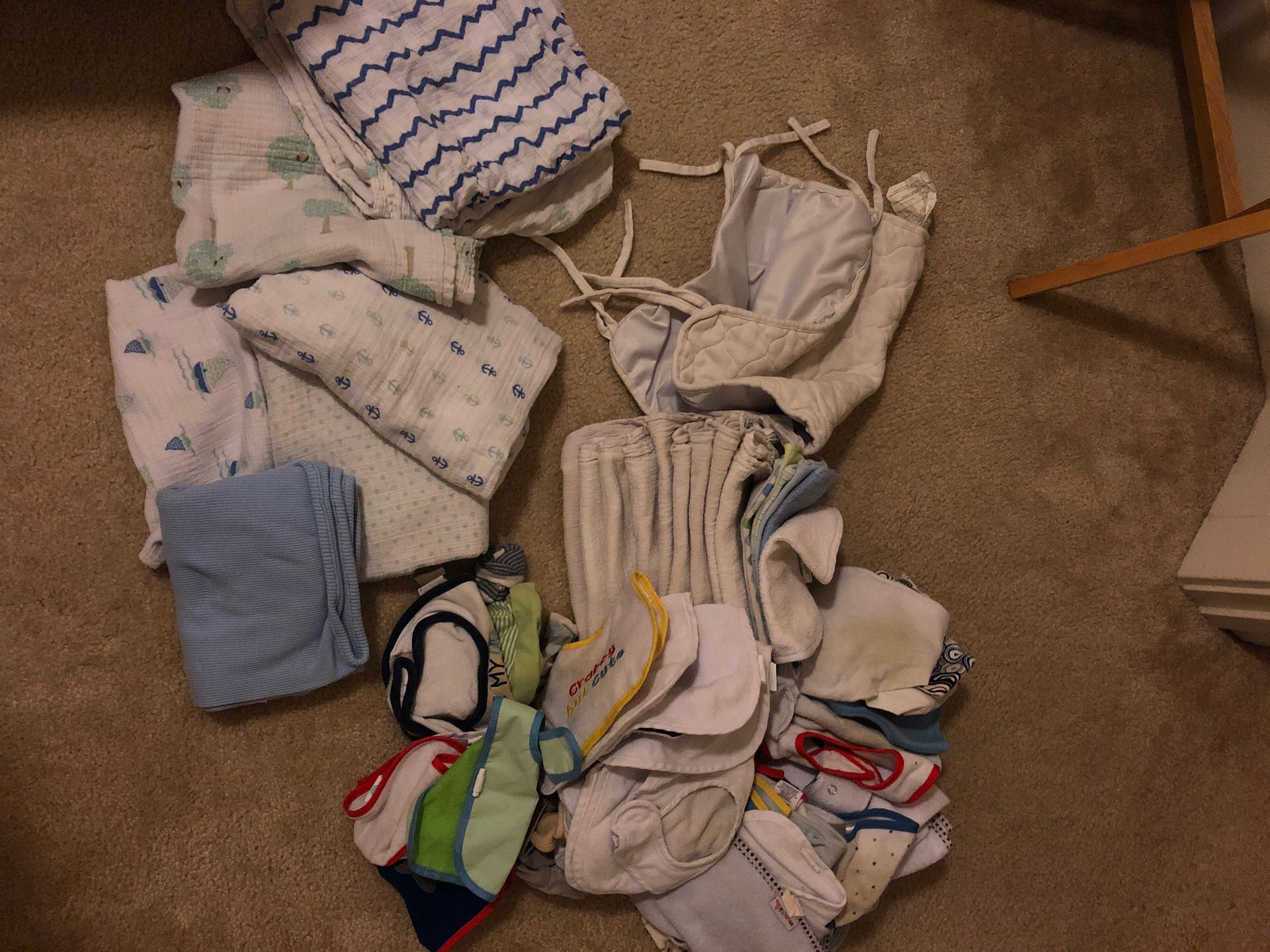 Blankets and bibs and wash cloths