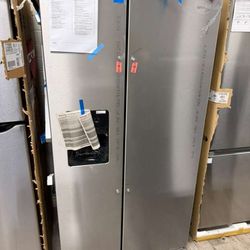 Whirlpool stainless steel side by side refrigerator brand new with warranty