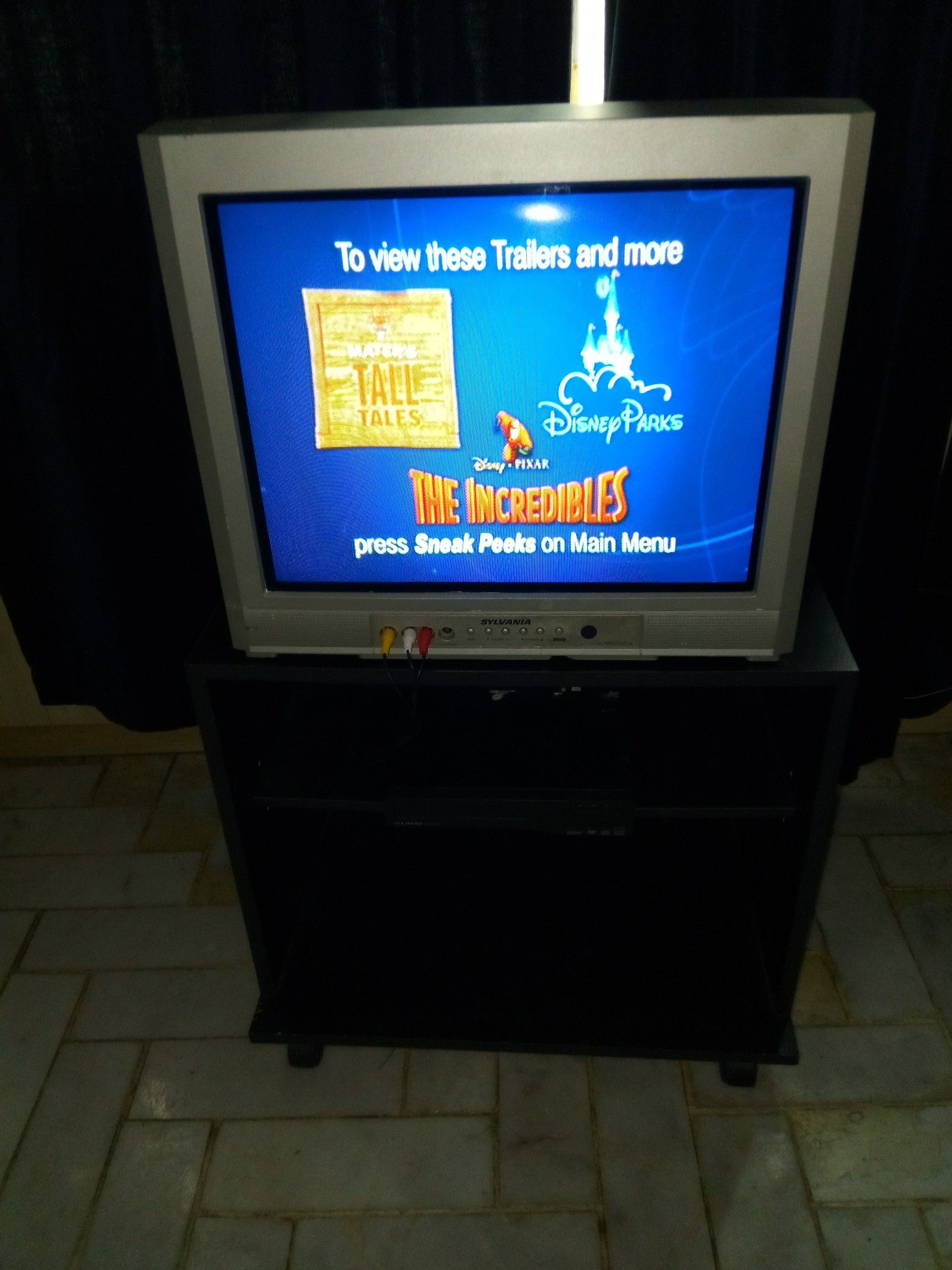 Sylvania CRT 20 inch TV, DVD player, TV stand and universal remote