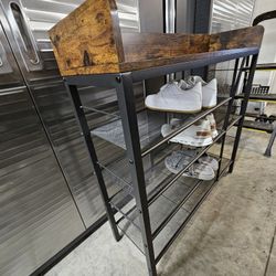 Entryway table with shoe organizer