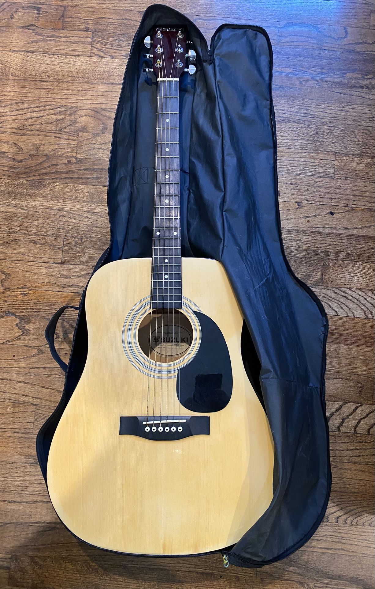 SUZUKI ACOUSTIC GUITAR. used, in original bag in great condition