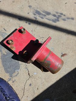 Red painted metal mounting bracket