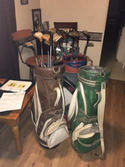 Golf bags and clubs