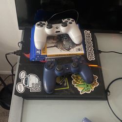 PS4 + 2 Controllers And 3 Games 