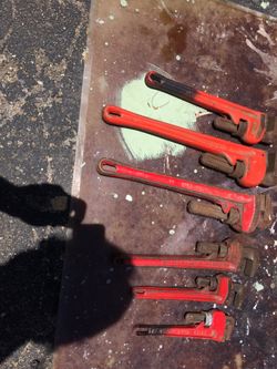 Six pipe wrenches