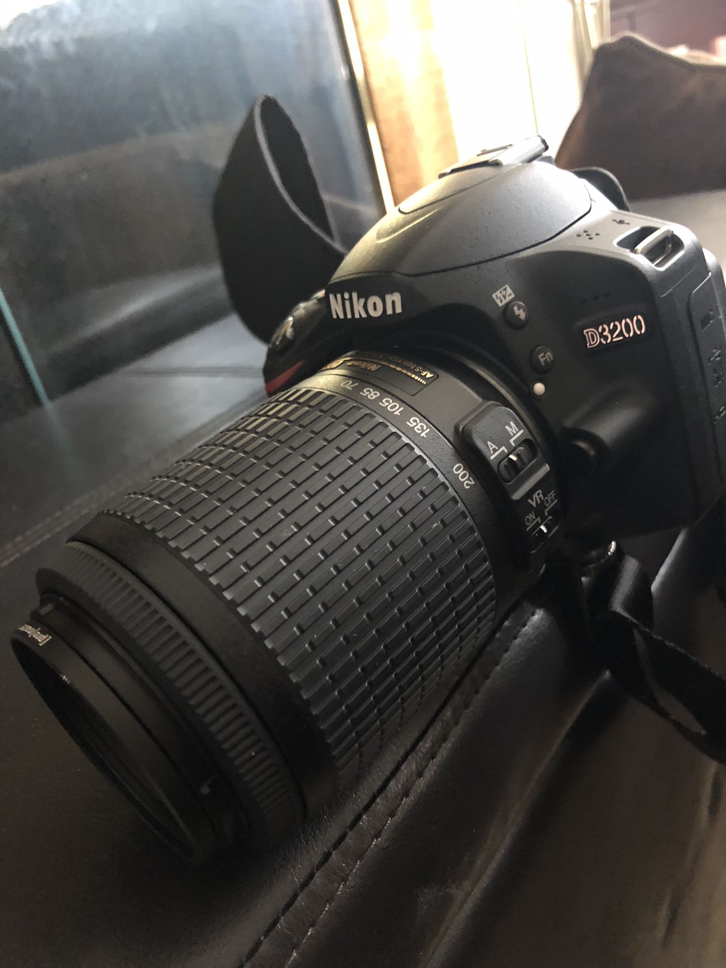 Nikon 3200 with 2 lenses and case and extra battery and tripod. Great condition.