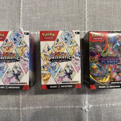 Pokémon Prismatic Evolutions and Phantasmal Flames Booster Bundle