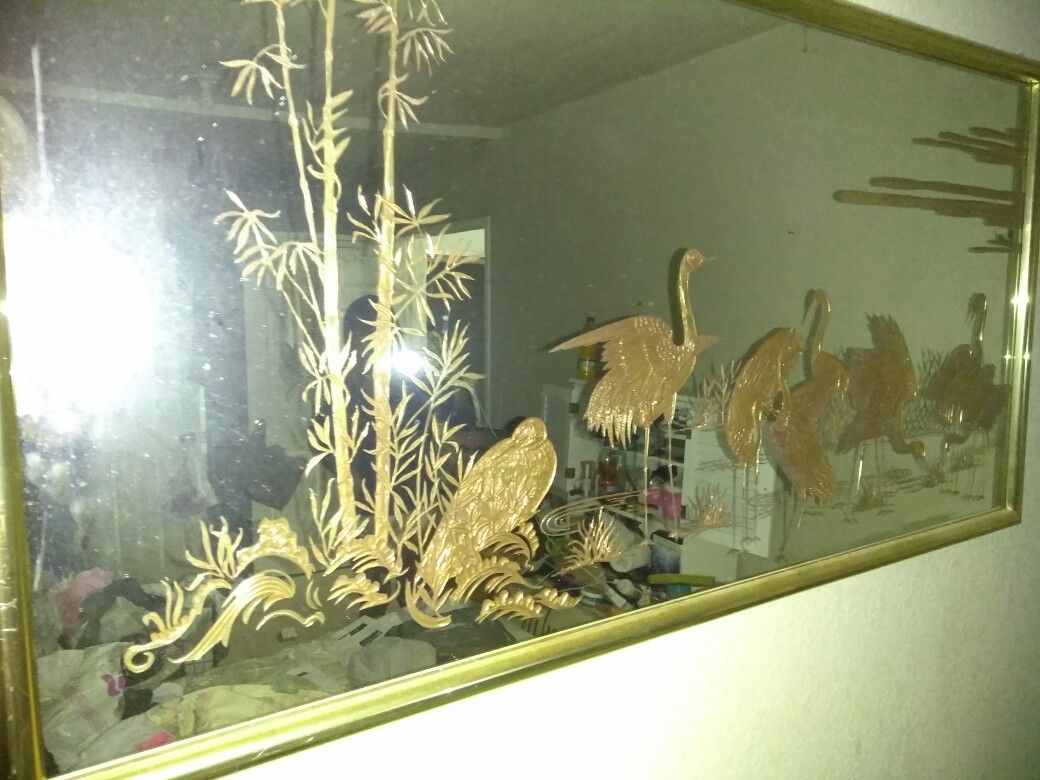 Antique golden sculpted mirror