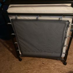 Fold Up Cot on Wheels 