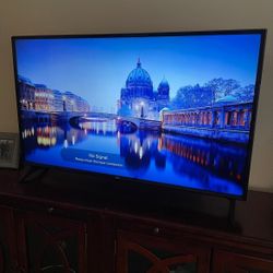 LG 49 inch Flat Screen TV UHD Smart LED Includes remote and stand