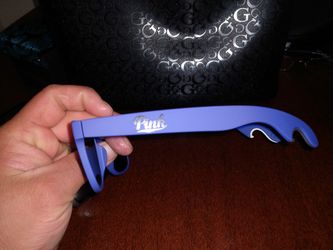 Pink sunglasses and bottle opener