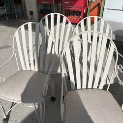 4 Vintage Chairs On Wheels 