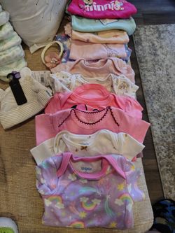 Babygirl onesies total of 11.