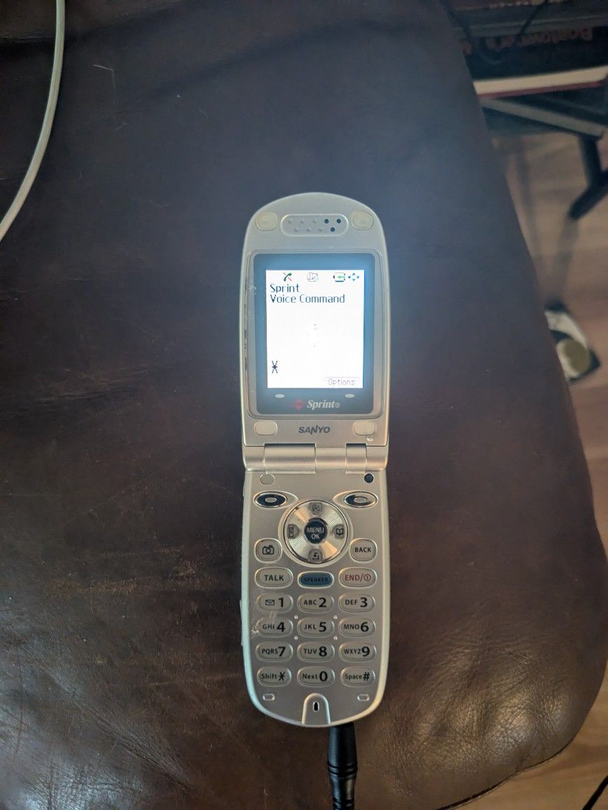 Sanyo Flip Phone By Sprint Model PM8200 Silver. Works And Comes With Original Charger! $30