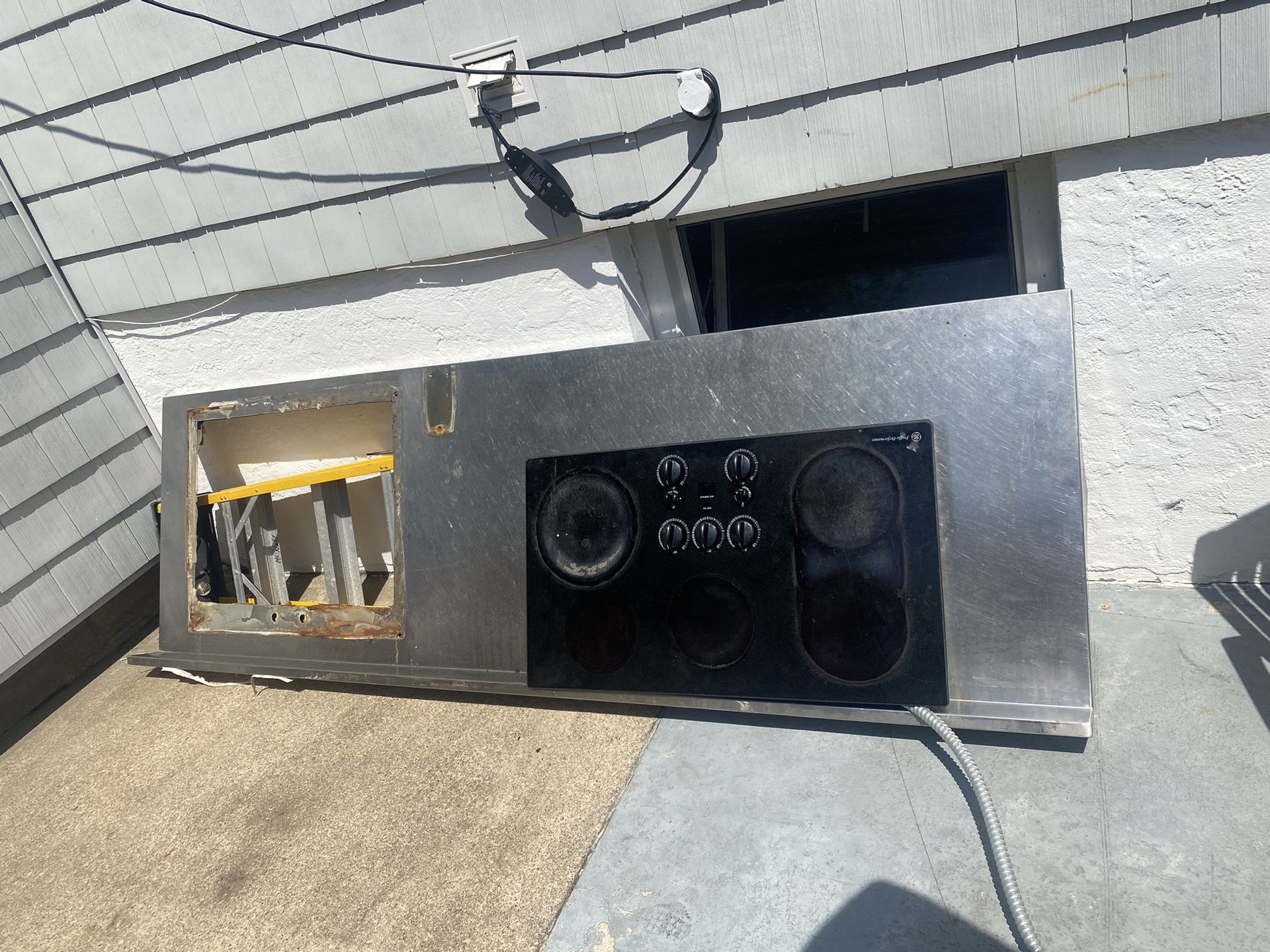 Stainless Steel Countertop and Electric Stovetop