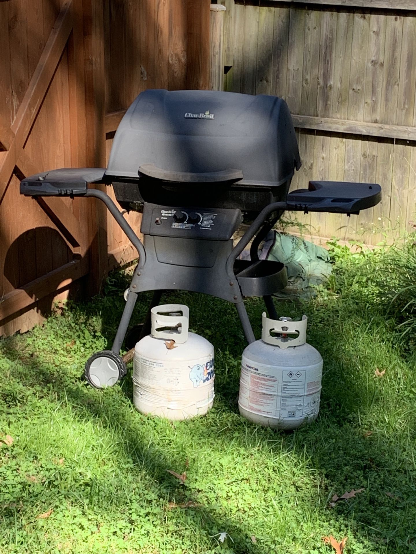 Grill and propane tanks