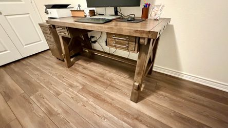This rustic industrial/farmhouse style solid office furniture set features a textured weathered brown/grey finish, exposed metal bolt details, and X-f