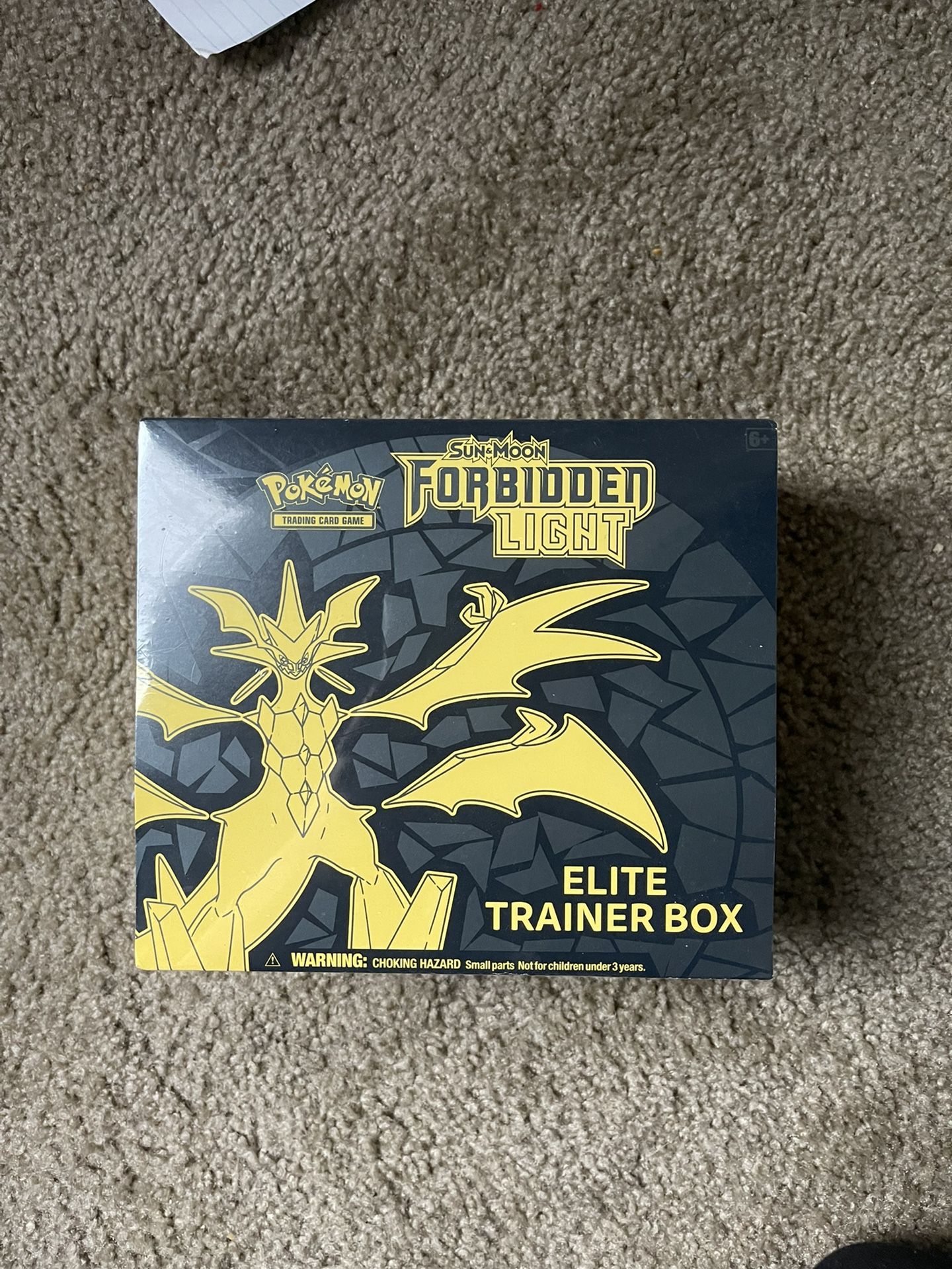 Forbidden Light Pokémon Trainer Box