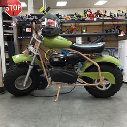 Coleman Mini Bike With Helmet