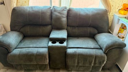 2 pieces sofa set. Microfiber material. Both Reclining with Center Console