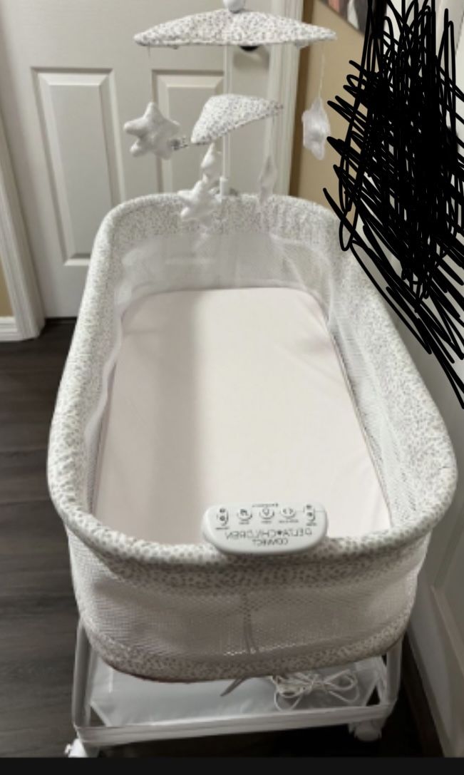 •	Delta Children SmartSleep Auto Glide Bassinet ( Electric) with Bluetooth: