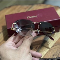 Cartier Glasses Brown / Gold