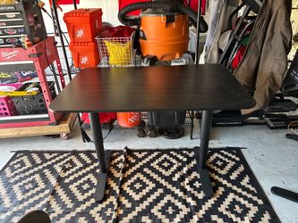 Black desk Size: 31” x 47”