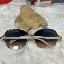 TAHARI SUNGLASSES  (read)