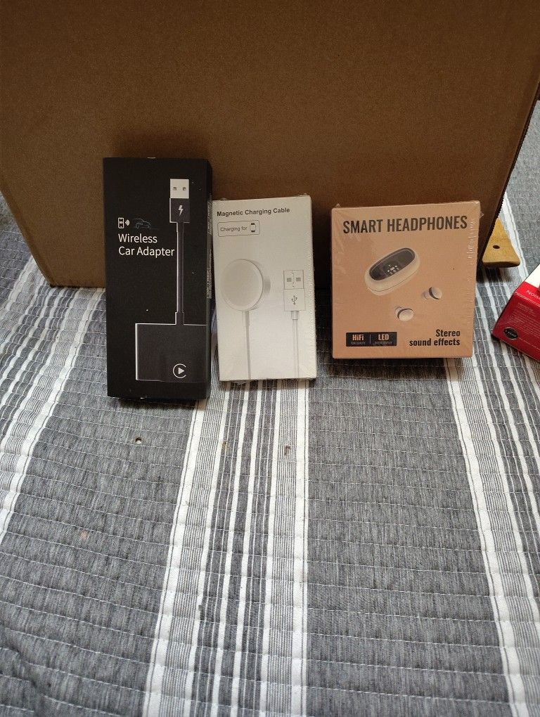 Wireless Car Adapter Apple Charger And Earbuds.