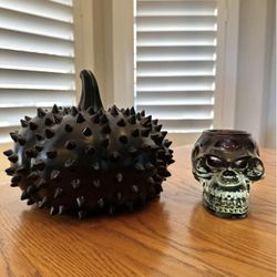 $12 for both - New resin black studded pumpkin & Gently used glass skull (heavy) votive candle holder.  Please pickup in the area of 36th Ave and Pinn