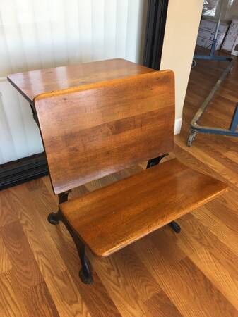 ANTIQUE SCHOOL DESK CAST IRON AND WOOD ALL ORIGINAL  EXCELLENT CONDITION  30” TALL 24” WIDE 34” LONG W/ CHAIR DOWN  24” LONG W/ CHAIR UP “WE’VE MADE I