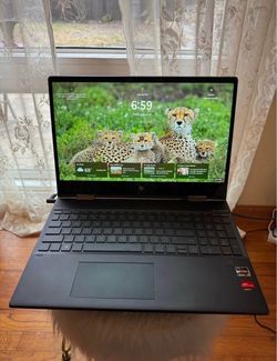 HP Envy x360 15” Ryzen 7 8GB RAM 512GB SSD