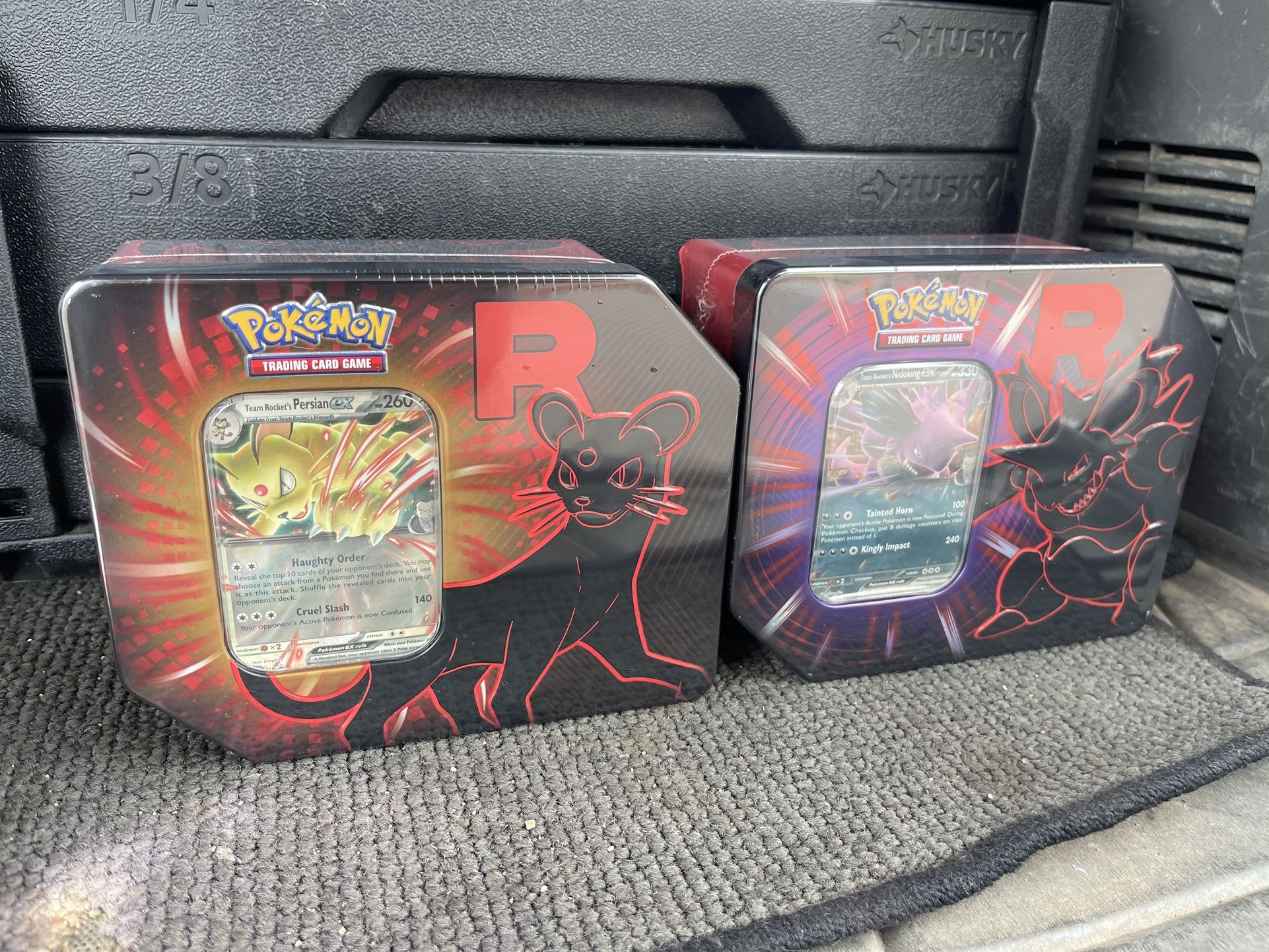 Destined Rivals team rocket tin 