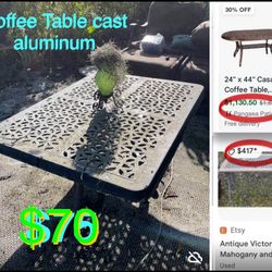 $70 Cast Classics Coffe Table cast aluminum 42” by 30” by 19” tall can be painted as desired,sturdy