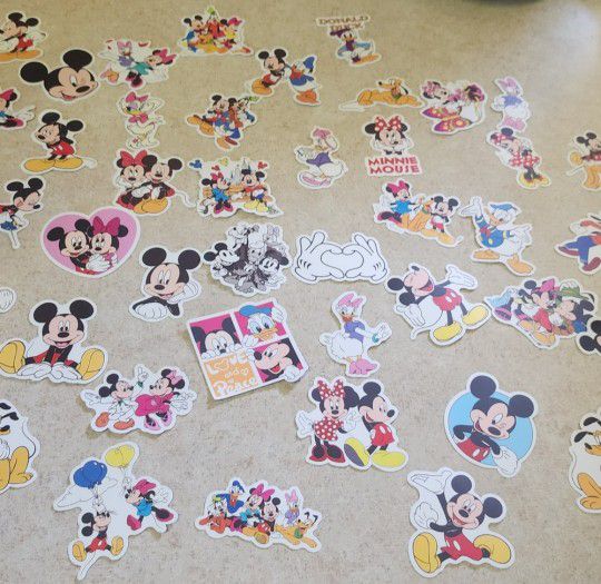 50 Mickey And Minnie Mouse stickers.  Many other stickers available.  SHIPPING IS AVAILABLE 