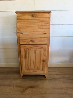Pine secretary desk with fold down work surface, small drawer, and cabinet