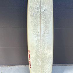 Surfboard: 9 ft Surftech NSP Longboard