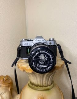 Canon AE-1 35mm Camera With FD 35-105mm 1984 Olympic Lens with original strap