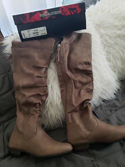 Beige high knee boots