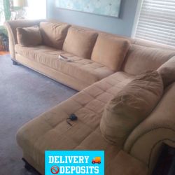 Tan  studded L shaped Sectional couch 