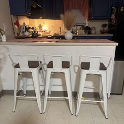 Barstool and table and chairs